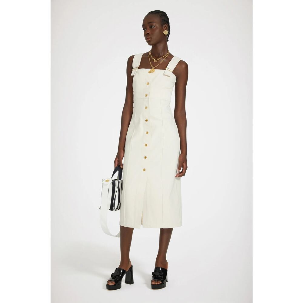 Patou Dungaree dress in regenerated cotton denim